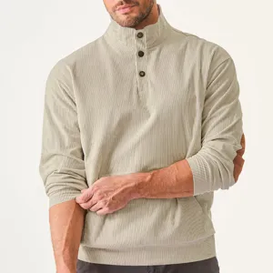 Men's corduroy stand collar long sleeve shirt detail view showing button placket and elbow patch.