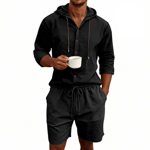 Close-up view of the black men's linen hooded shirt and shorts set showing fabric details.