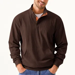 Detailed view of men's brown corduroy mock neck long sleeve sweatshirt with front pocket.