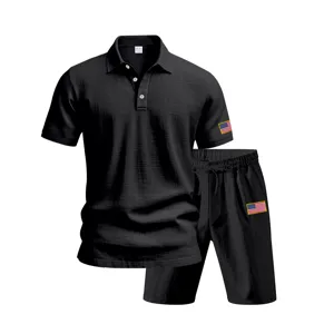 Detailed view of the black men's casual polo shirt and shorts set with flag embroidery.