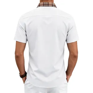 Detail view of the men's short-sleeve polo shirt featuring a classic plaid collar design.