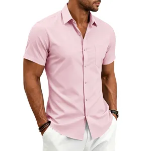 Close-up detail of the classic men's pink short-sleeve button-down shirt with a clean chest pocket.