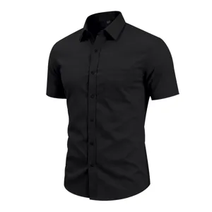 Close-up details of black short sleeve button up dress shirt lapel and chest pocket.