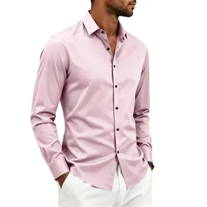 Detail view of a men's long sleeve pink dress shirt with black buttons and classic collar.