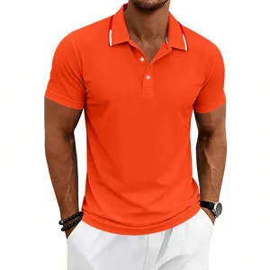 Mens short sleeve orange polo shirt detail view, casual golf wear with contrast collar trim.