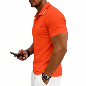 Detail shot of a vibrant orange men's short sleeve polo shirt with classic lapel collar.