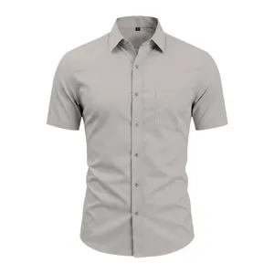 Details of men's grey short sleeve business shirt with lapel collar and chest pocket.