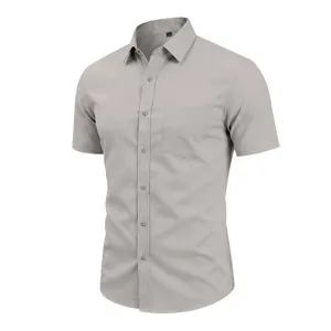 Detailed view of the men's solid grey short-sleeve business casual shirt fabric and collar.
