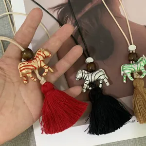 Designer painted zebra tassel necklace long sweater chain for women stylish jewelry