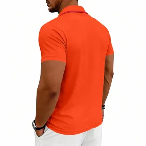 Back view detail of bright orange men's short sleeve polo shirt with red collar trim.