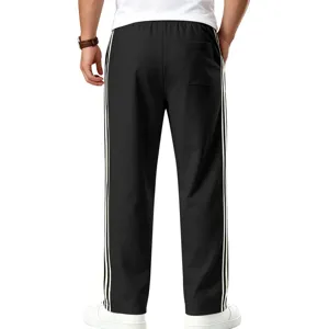 Pantalon de jogging homme sport décontracté coupe droite avec bandes latérales blanches.