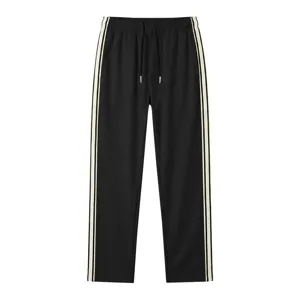 Pantalon de survêtement sport homme coupe droite avec bandes latérales pour fitness