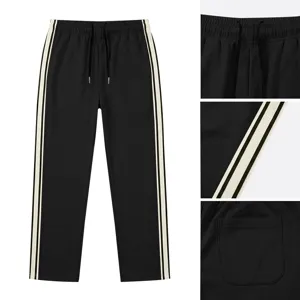 Pantalon de survêtement sport homme coupe droite avec bandes latérales contrastées