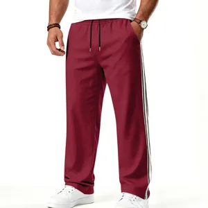 Pantalon de survêtement décontracté ample pour homme avec bandes latérales contrastées et cordon.