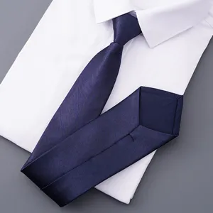 Dark blue business zipper tie detail, classic formal wear necktie for men and professional work.