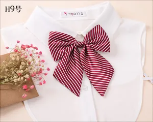Professional women's uniform striped bow tie collar detail, elegant and stylish office wear.