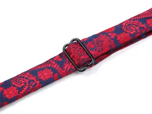 Close-up detail of the wine red and navy blue floral jacquard bow tie adjustable strap.
