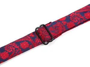 Close-up detail of red and blue jacquard adjustable bow tie strap with black metal adjuster.