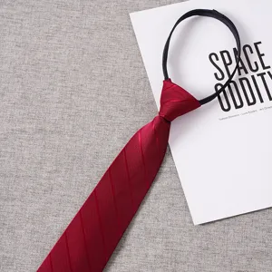 Detailed view of wine red zipper necktie with textured fabric and convenient loop.