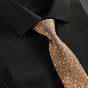 Men's business formal black dress shirt with retro patterned orange tie set, elegant style.