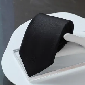 Classic black business tie detail, high-density fabric texture, elegant formal wear accessory