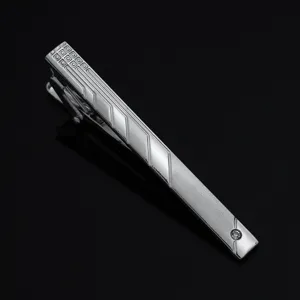 Men's silver tie clip minimalist geometric pattern formal business wedding fashion accessory detail view