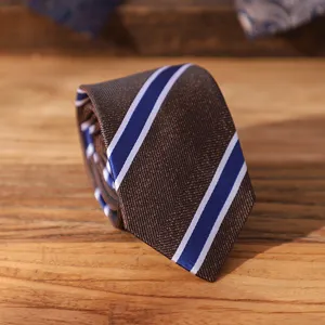 Close-up detail of the vintage striped necktie showcasing fine texture and classic business style.