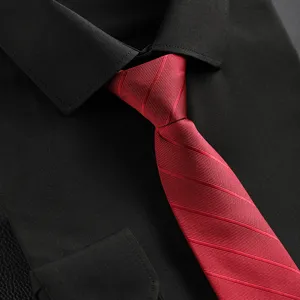 Red striped necktie detail shot showing fabric texture and classy knot for formal business wear.