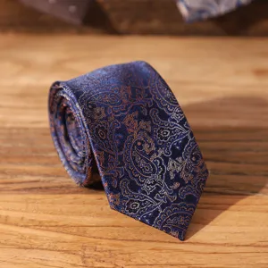 Classic blue paisley men's necktie, elegant vintage British style for business formal wear.