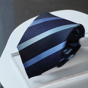 High-end blue striped necktie detail, professional business formal wear accessory closeup view.