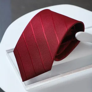 Premium wine red striped necktie for business formal wear and wedding grooming events.