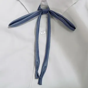Detailed view of the blue JK uniform tie, elegant ribbon design for sailor suits and shirts.