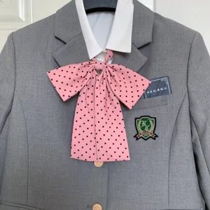 Japanese JK uniform set with grey blazer, white shirt and cute pink polka dot bow tie.