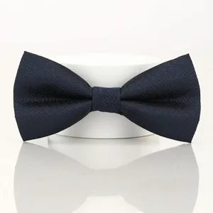 Detailed view of the dark blue herringbone men's bow tie, perfect for formal events.
