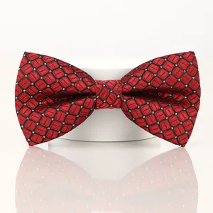 Detailed view of a stylish red and black geometric pattern men bow tie for wedding and party.