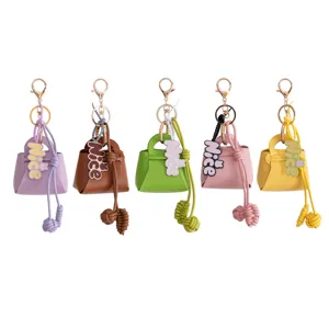 Mini PU leather handbag keychain charm coin purse cute bag pendant in five vibrant colors.