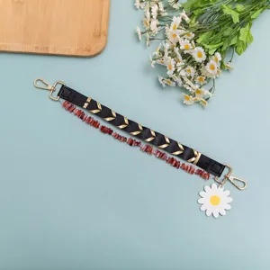 Short bag strap replacement with beaded stone and daisy charm for handbags and purses.