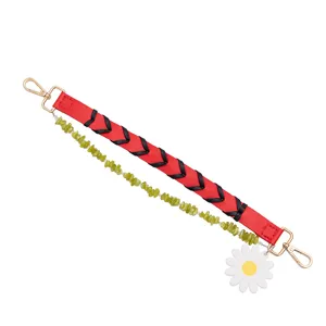 Red braided leather handbag strap with green bead strand and daisy charm, replacement bag belt