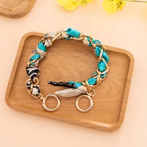 Cadena de metal dorado entrelazada con un pañuelo de seda azul correa de bolso 35cm