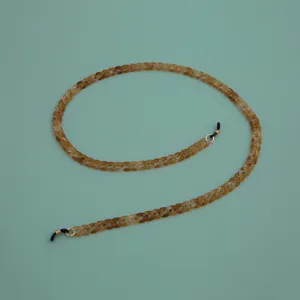 Detailed view of the colorful acrylic glasses chain link texture and connector rings.