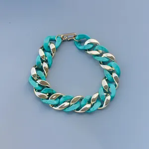 Geometric acrylic and gold chain necklace, turquoise link style detail view for women.