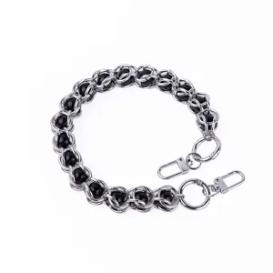 Detailed view of the metal wrapped bead chain with lobster clasps, showing fine craftsmanship.