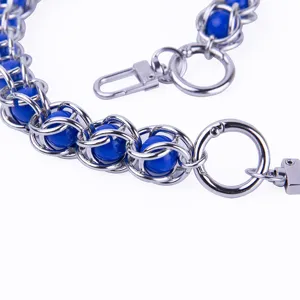 Metal chain with blue acrylic beads, ideal for stylish handbags and phone case straps.
