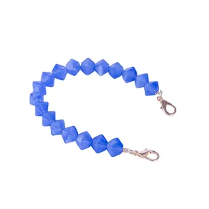 Blue acrylic faceted bead bag chain detail view with metal lobster clasps for handbags.