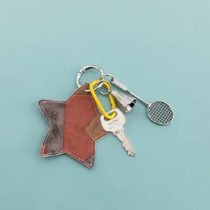 PU leather star keychain with badminton racket pendant, cute bag charm and car key ring.