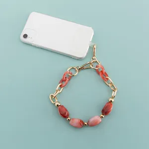 Short phone chain strap detail, acrylic resin and gold metal links accessory for phone case
