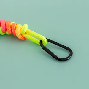 Colorful woven rope bag charm keychain with black metal carabiner for women handbags.