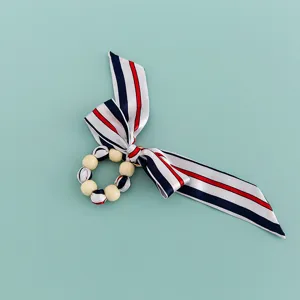 Creative silk scarf wrapped beaded bow wood bead keychain and bag decoration accessory.