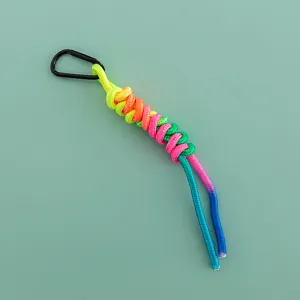 Colorful paracord bag charm featuring a black carabiner, vibrant keychain for stylish purses.