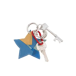 Patchwork star PU leather keychain detail with metal rings and key pendant for bags.